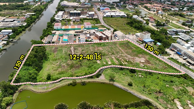 ขายที่ดินติดคลองมหาชัย ถ.เจษฎาวิถี เมืองสมุทรสาคร12-2-48ไร่ 08130